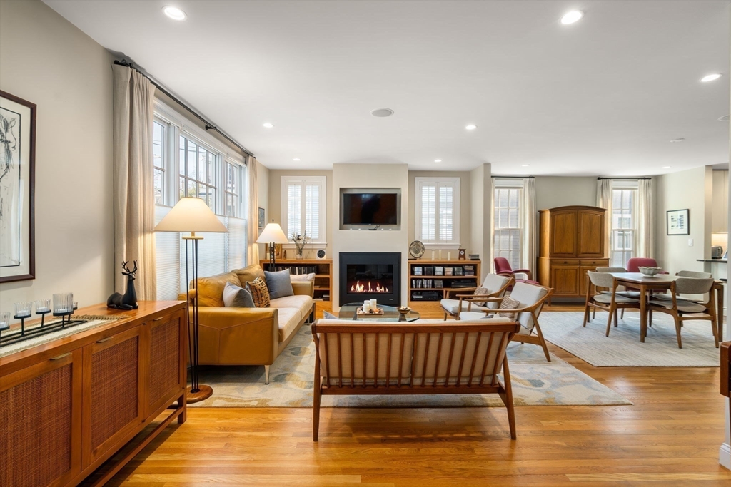 16 York Terrace Brookline, MA 02446 - Photo 4 of 42 a living room with fireplace furniture and a flat screen tv