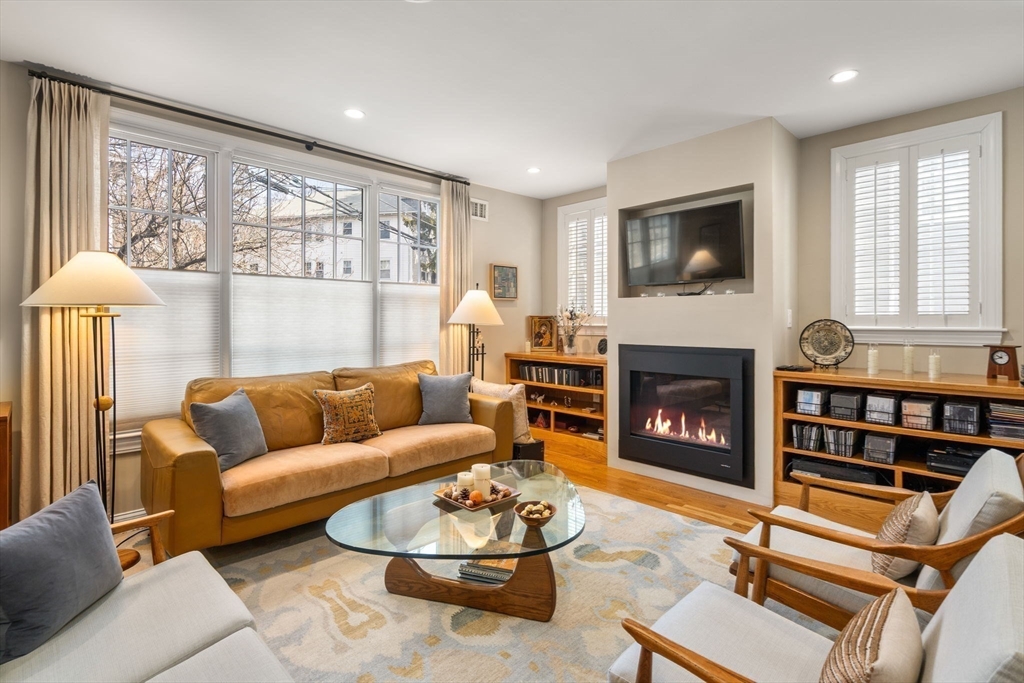 16 York Terrace Brookline, MA 02446 - Photo 5 of 42 a living room with furniture fireplace and a flat screen tv