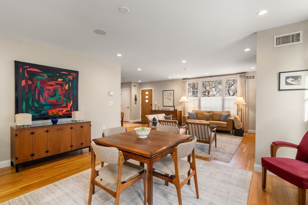 16 York Terrace Brookline, MA 02446 - Photo 9 of 42 a view of a dining room with furniture and wooden floor