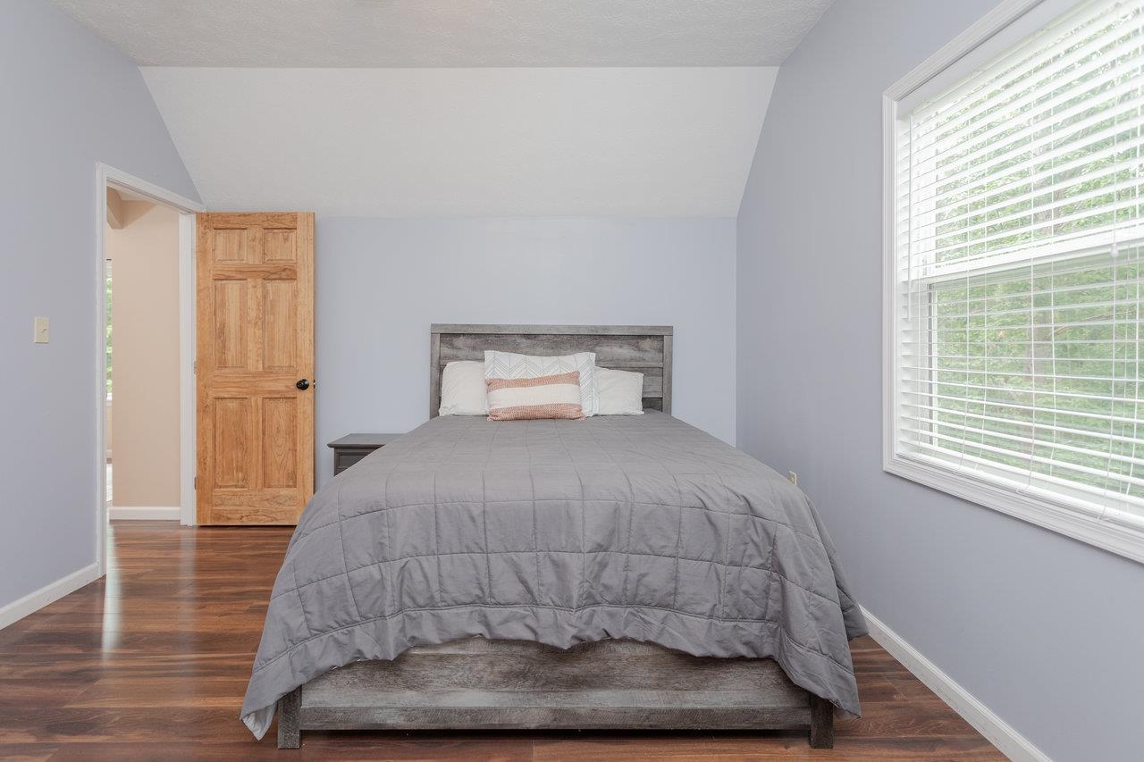 159 Park View Shenandoah, VA 22849 - Photo 38 of 70 a bedroom with a bed and wooden floor