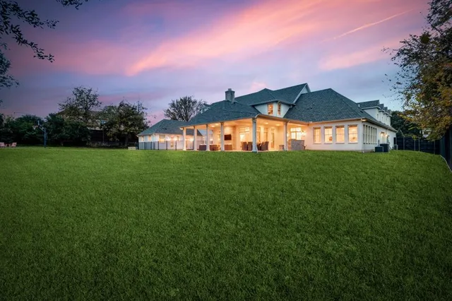 a front view of house with yard and seating area