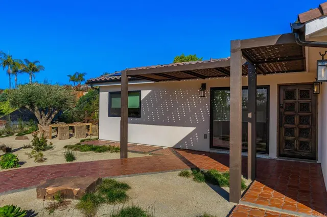 a view of a house with a patio