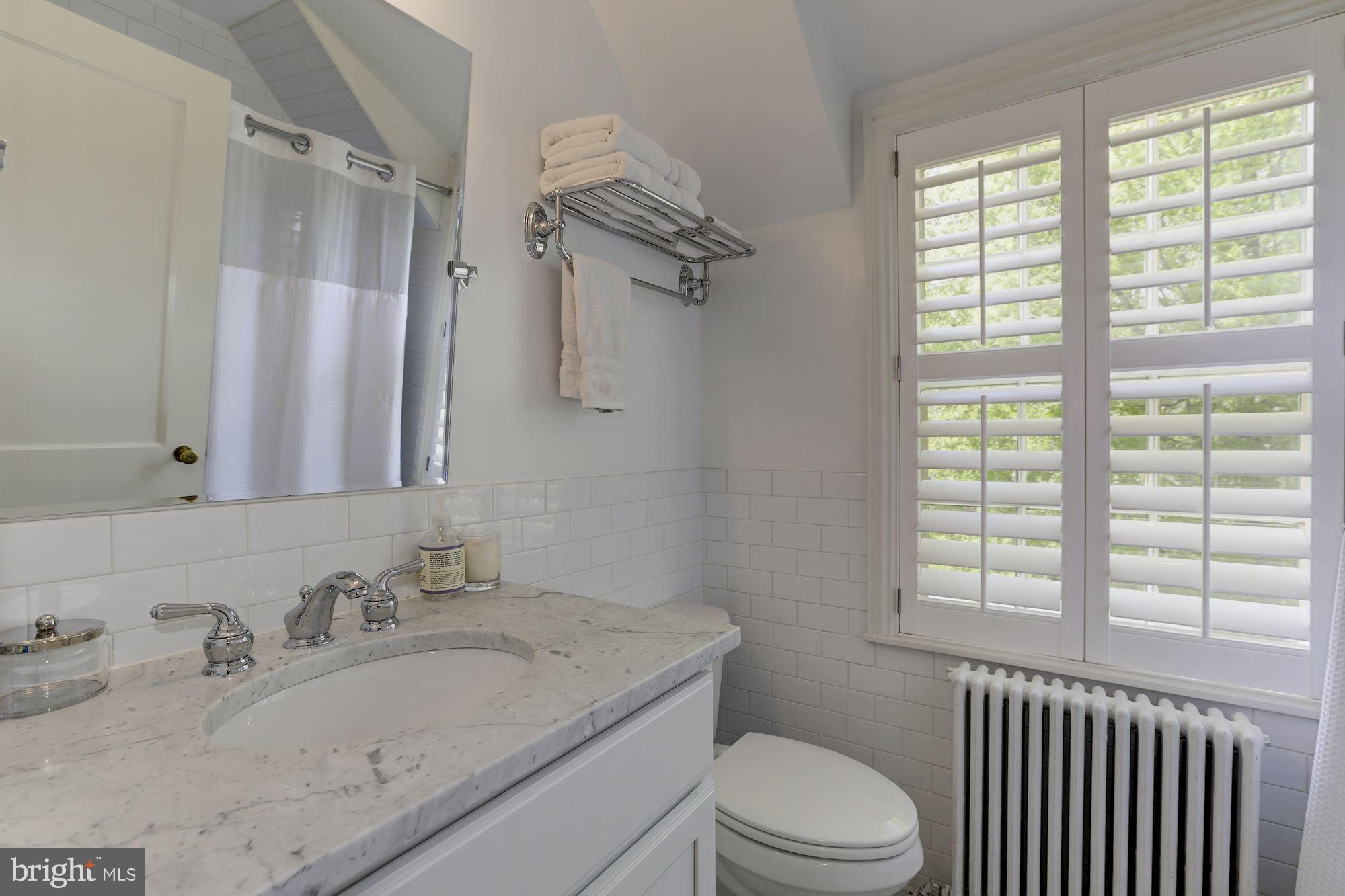 9023 Fairview Road Silver Spring, MD 20910 - Photo 22 of 32 Marble Full Hall Bath w/ Tub