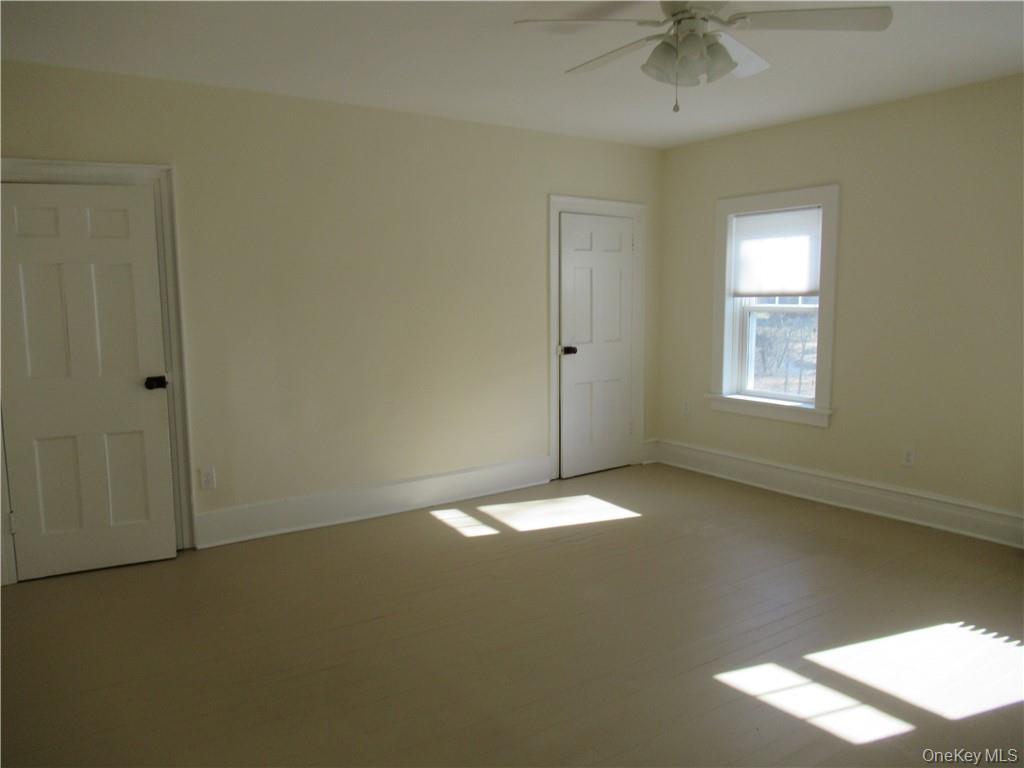 198 Big Island Road Warwick, NY 10990 - Photo 21 of 24 a view of an empty room with a window