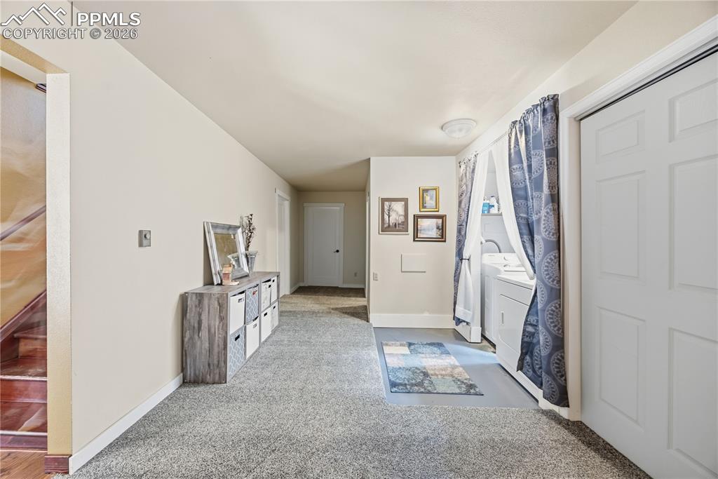 5130 Neeper Valley Road Manitou Springs, CO 80829 - Photo 27 of 38 a view of a hallway with closet and utility room
