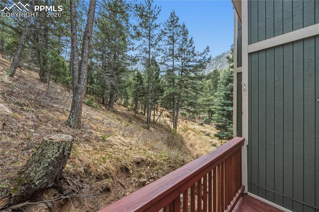 5130 Neeper Valley Road Manitou Springs, CO 80829 - Photo 35 of 38 a view of a forest from a balcony