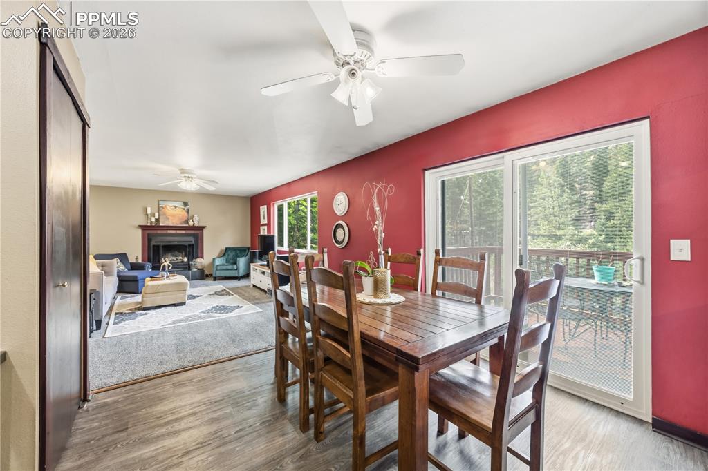 5130 Neeper Valley Road Manitou Springs, CO 80829 - Photo 10 of 38 a view of a dining room with furniture window and outside view