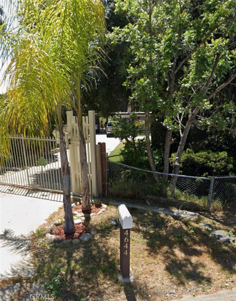 4644 La Canada Road Fallbrook, CA 92028 - Photo 1 of 26 a backyard of a house with lots of green space and fountain