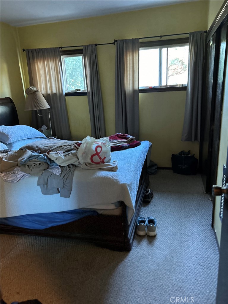 4644 La Canada Road Fallbrook, CA 92028 - Photo 16 of 26 a bedroom with a bed and a window