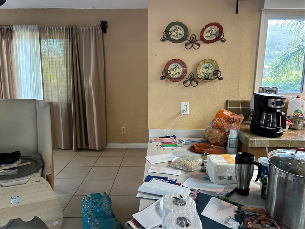 4644 La Canada Road Fallbrook, CA 92028 - Photo 23 of 26 a room with furniture and a window