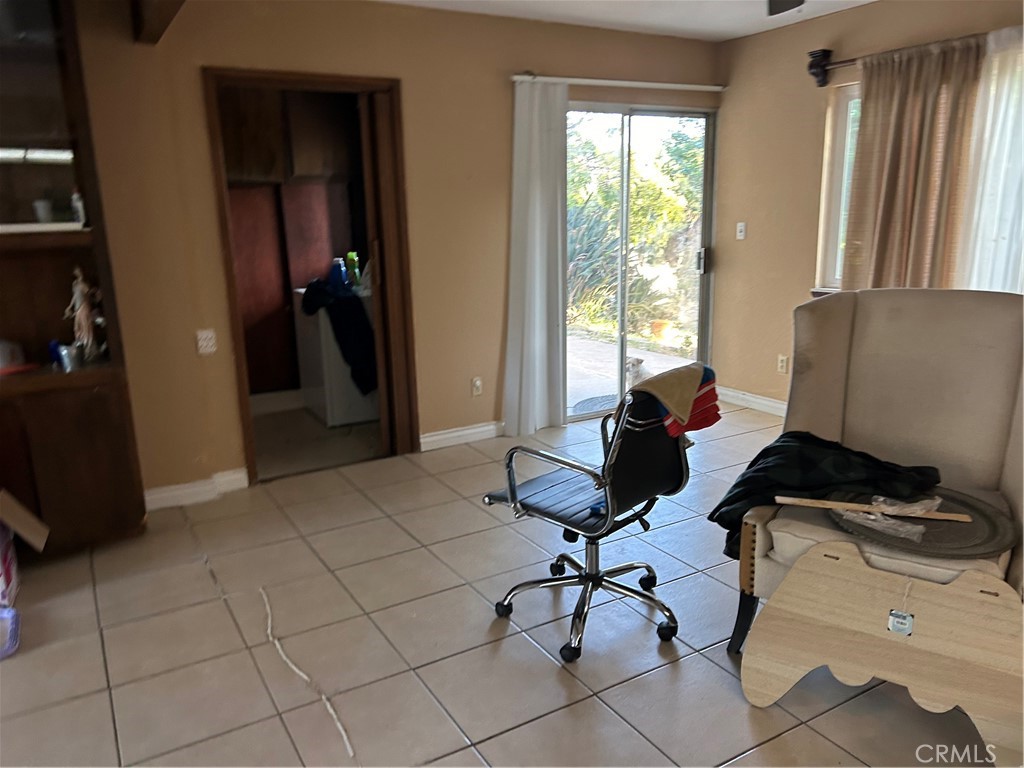 4644 La Canada Road Fallbrook, CA 92028 - Photo 24 of 26 a view of a workspace with furniture and a window