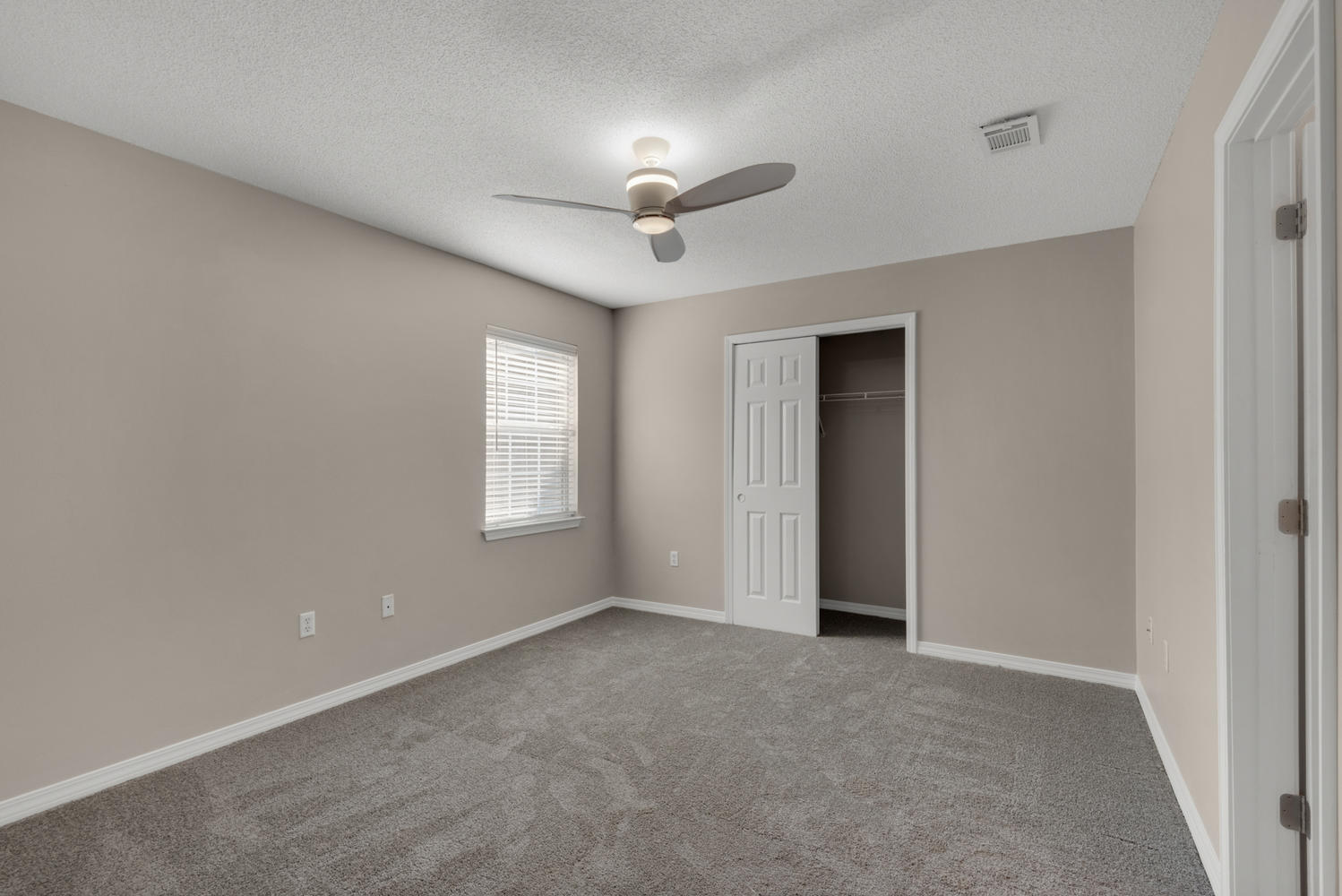 212 Tooke Street, Unit A Fort Walton Beach, FL 32547 - Photo 18 of 26 a view of an empty room with a window