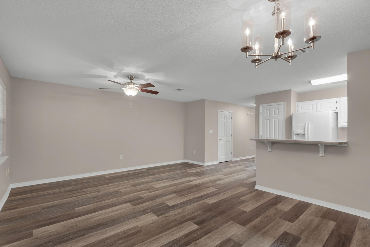 212 Tooke Street, Unit A Fort Walton Beach, FL 32547 - Photo 9 of 26 a view of a room with a ceiling fan