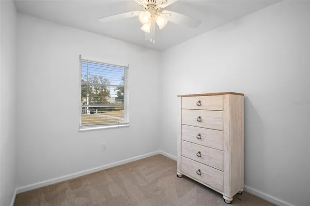 a view of a closet area with cabinets