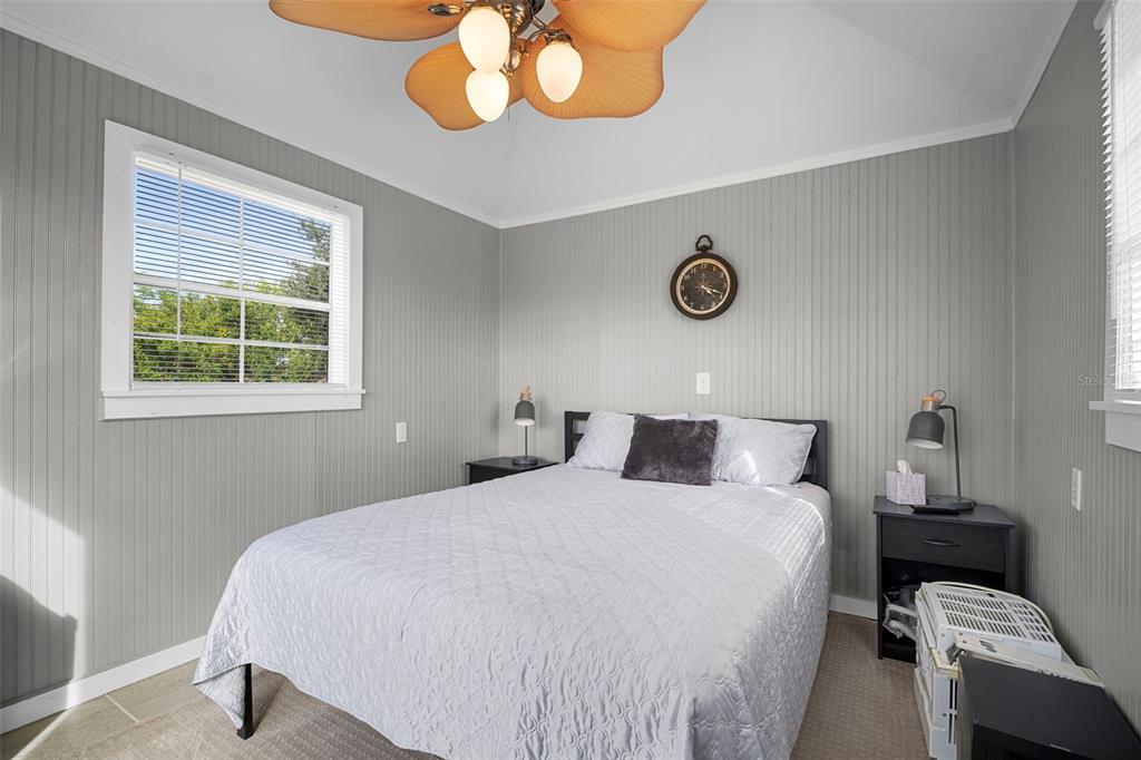 29098 Riverview Lane Punta Gorda, FL 33982 - Photo 23 of 35 a bedroom with a bed and a window