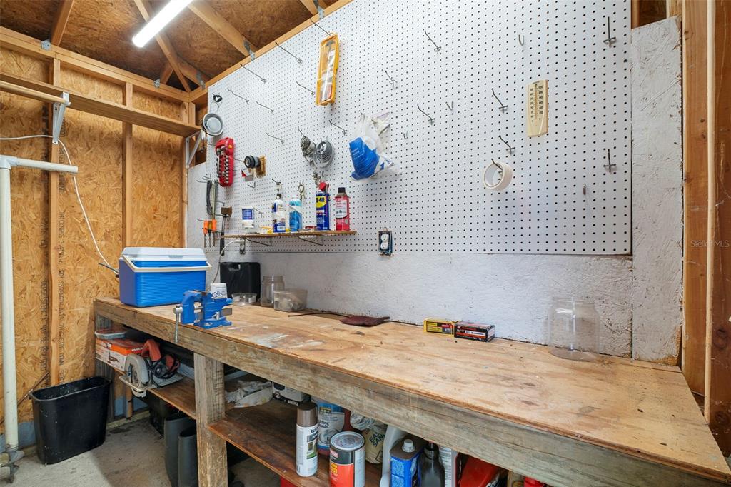 29098 Riverview Lane Punta Gorda, FL 33982 - Photo 25 of 35 a room with storage and utility