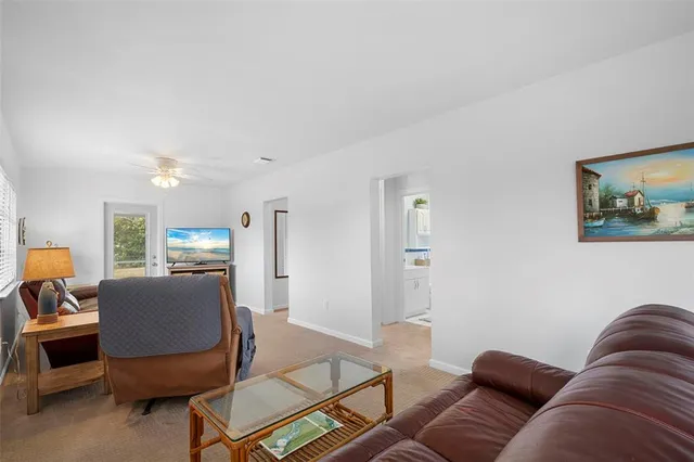 a living room with furniture and a couch