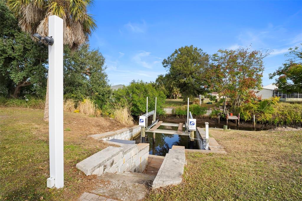 29098 Riverview Lane Punta Gorda, FL 33982 - Photo 35 of 35 a view of a patio with swimming pool