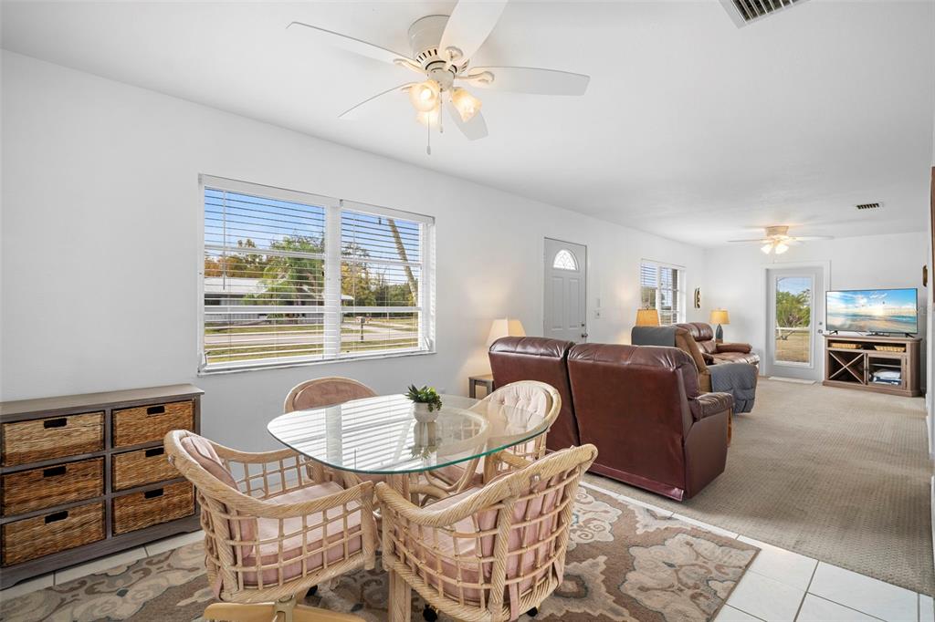 29098 Riverview Lane Punta Gorda, FL 33982 - Photo 7 of 35 a living room with furniture and a window