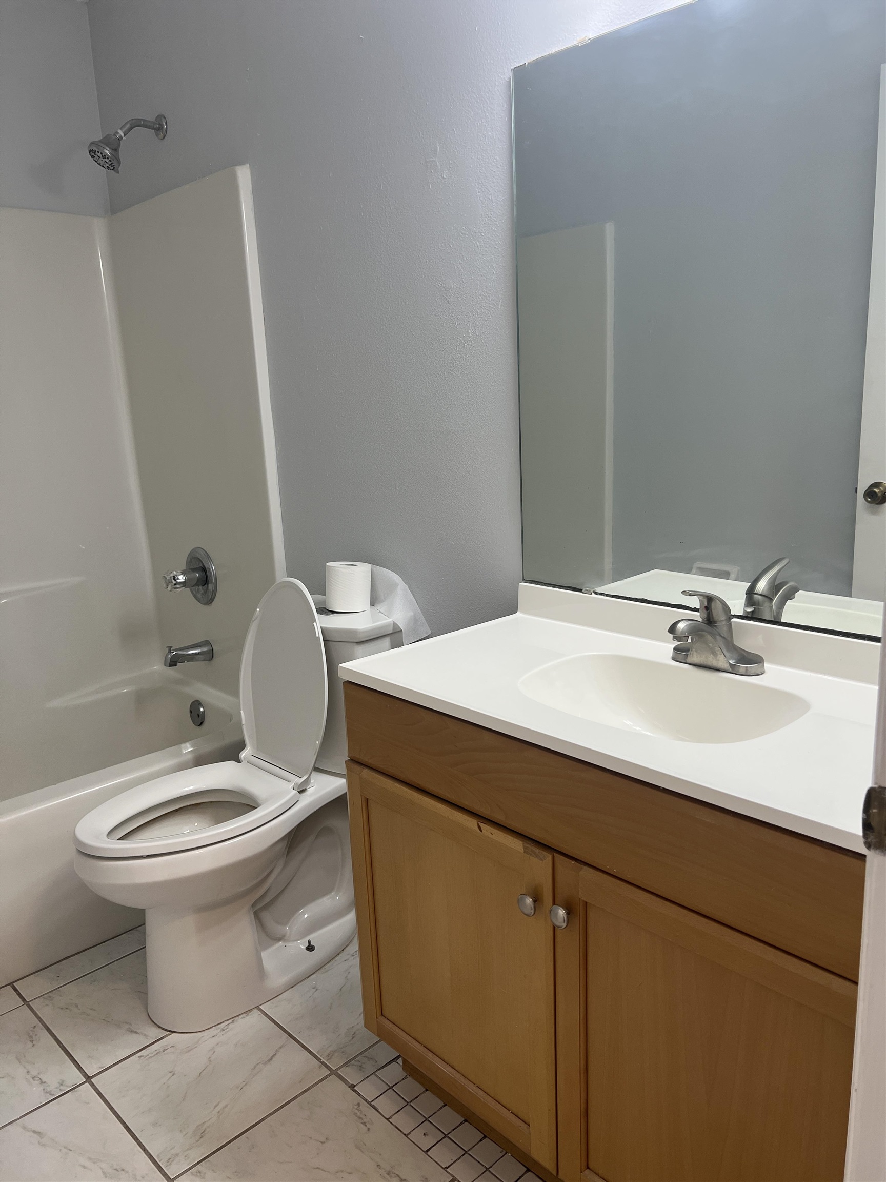 5465 Datil Pepper Road St. Augustine, FL 32086 - Photo 13 of 28 a bathroom with a sink toilet and mirror