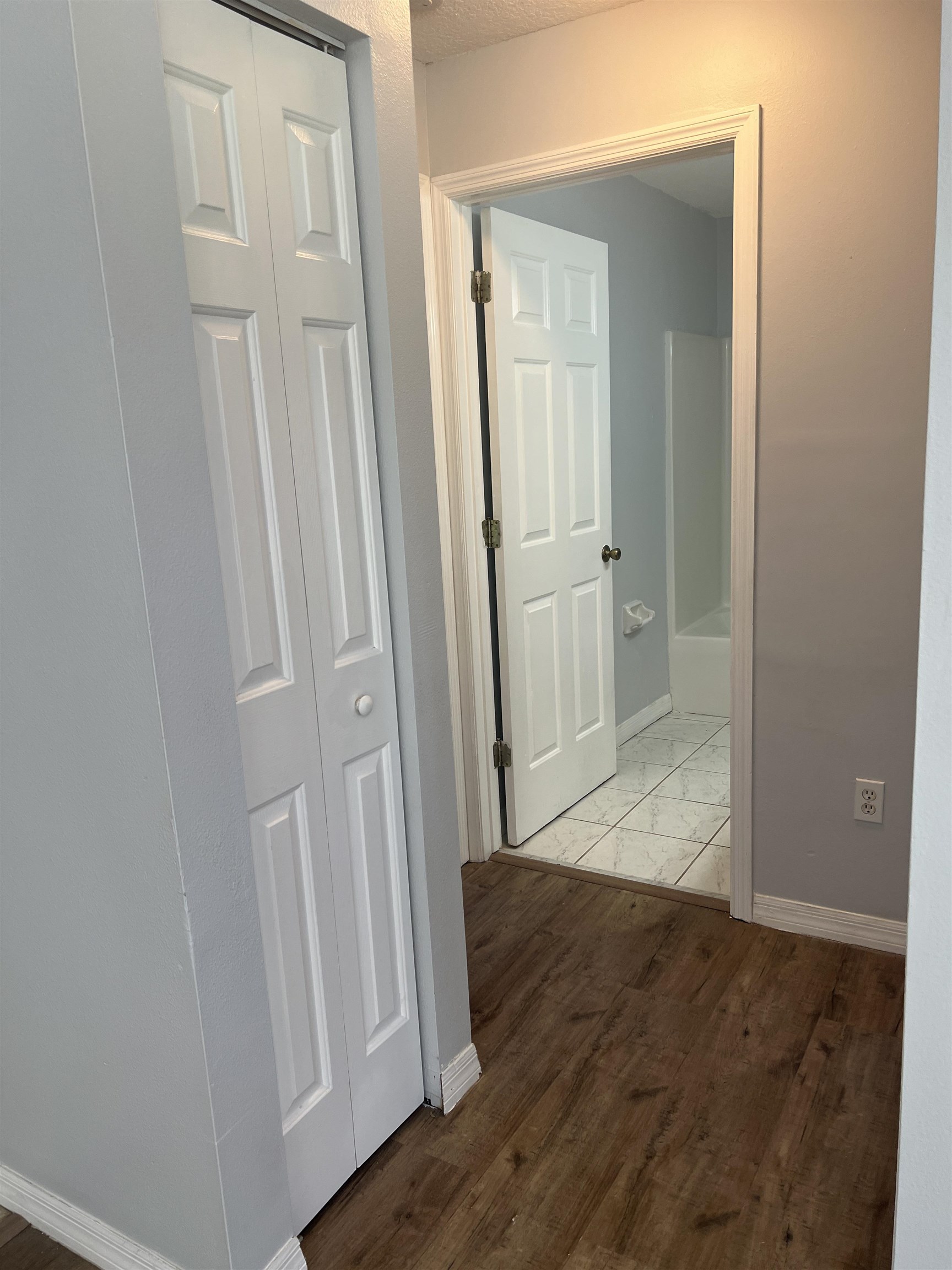 5465 Datil Pepper Road St. Augustine, FL 32086 - Photo 15 of 28 an empty room with wooden floor and entrance