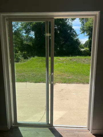 a view of backyard with green space