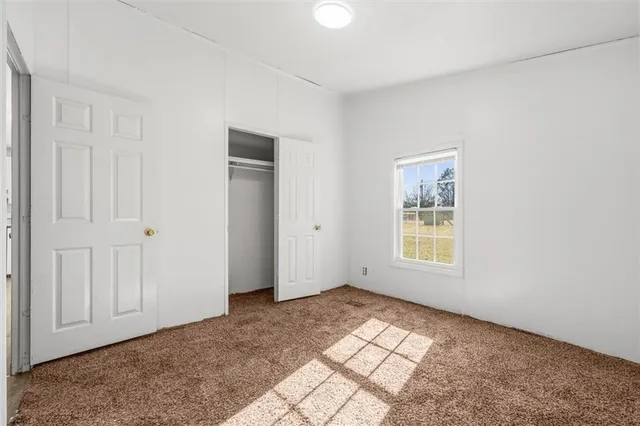 an empty room with windows