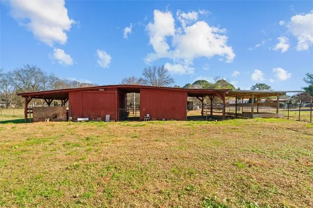 a view of swimming pool with an outdoor space and seating area