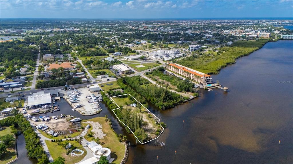 6141 Elliott Street Punta Gorda, FL 33950 - Photo 1 of 11 an aerial view of multiple house