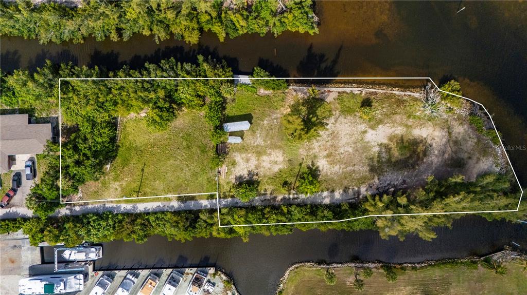 6141 Elliott Street Punta Gorda, FL 33950 - Photo 3 of 11 an outdoor view with swimming pool