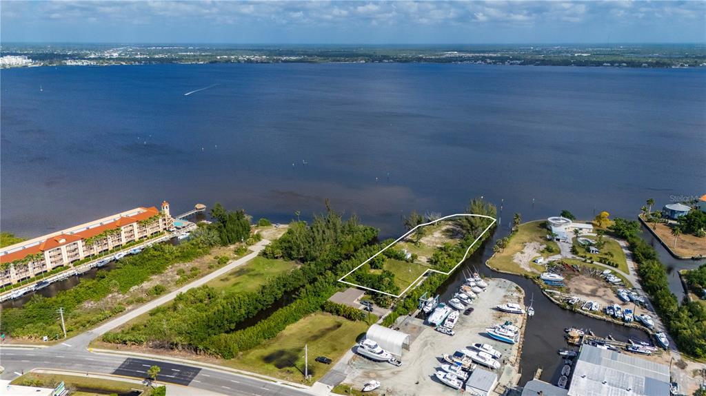 6141 Elliott Street Punta Gorda, FL 33950 - Photo 4 of 11 view of the ocean from a balcony