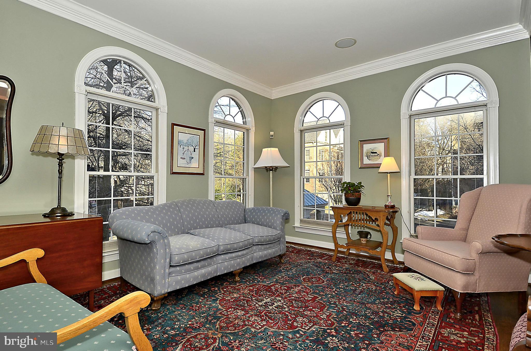 148 Rees Place Falls Church, VA 22046 - Photo 11 of 29 a living room with furniture and a large window