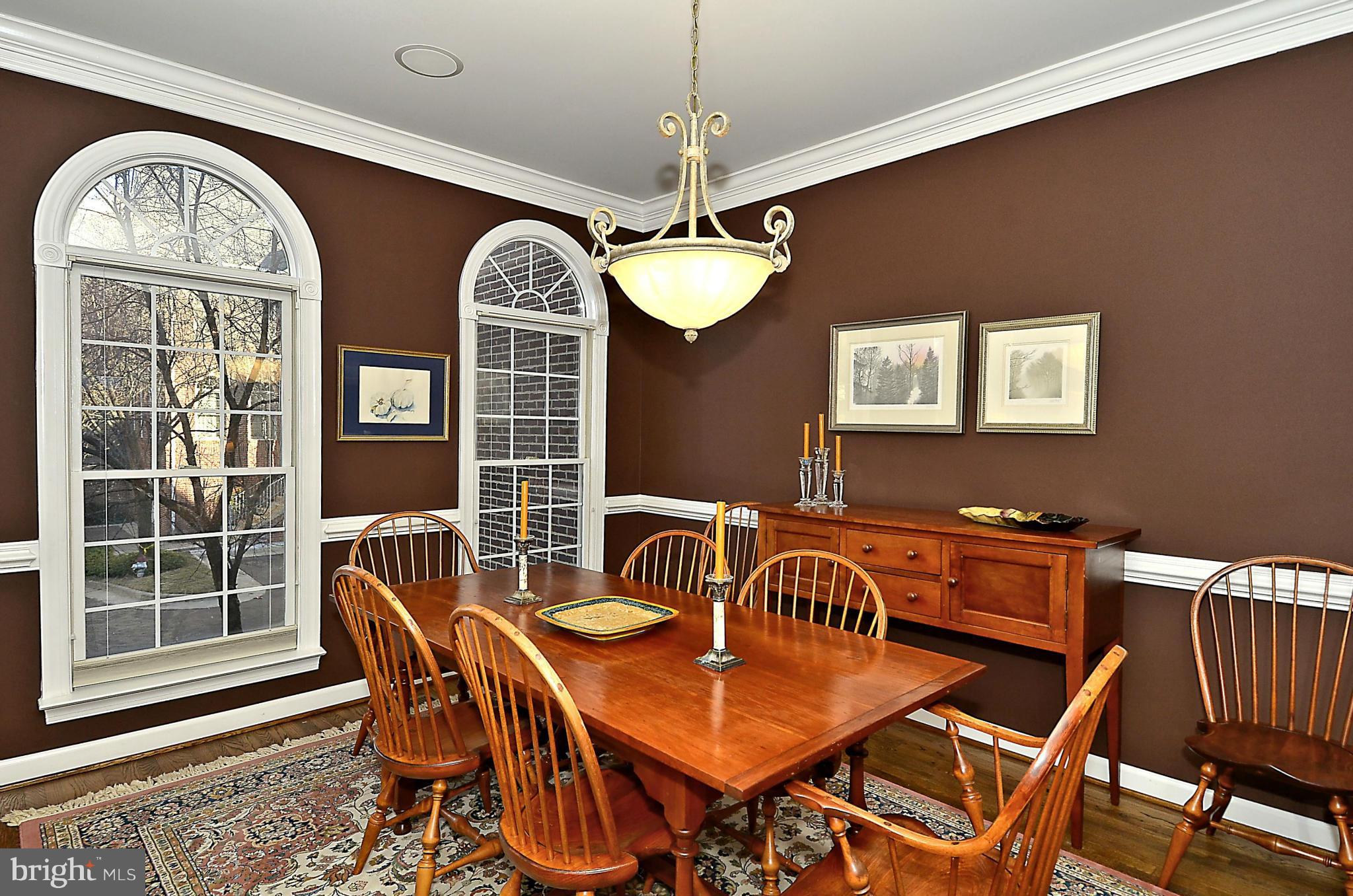 148 Rees Place Falls Church, VA 22046 - Photo 12 of 29 a view of a dining room with furniture wooden floor and chandelier