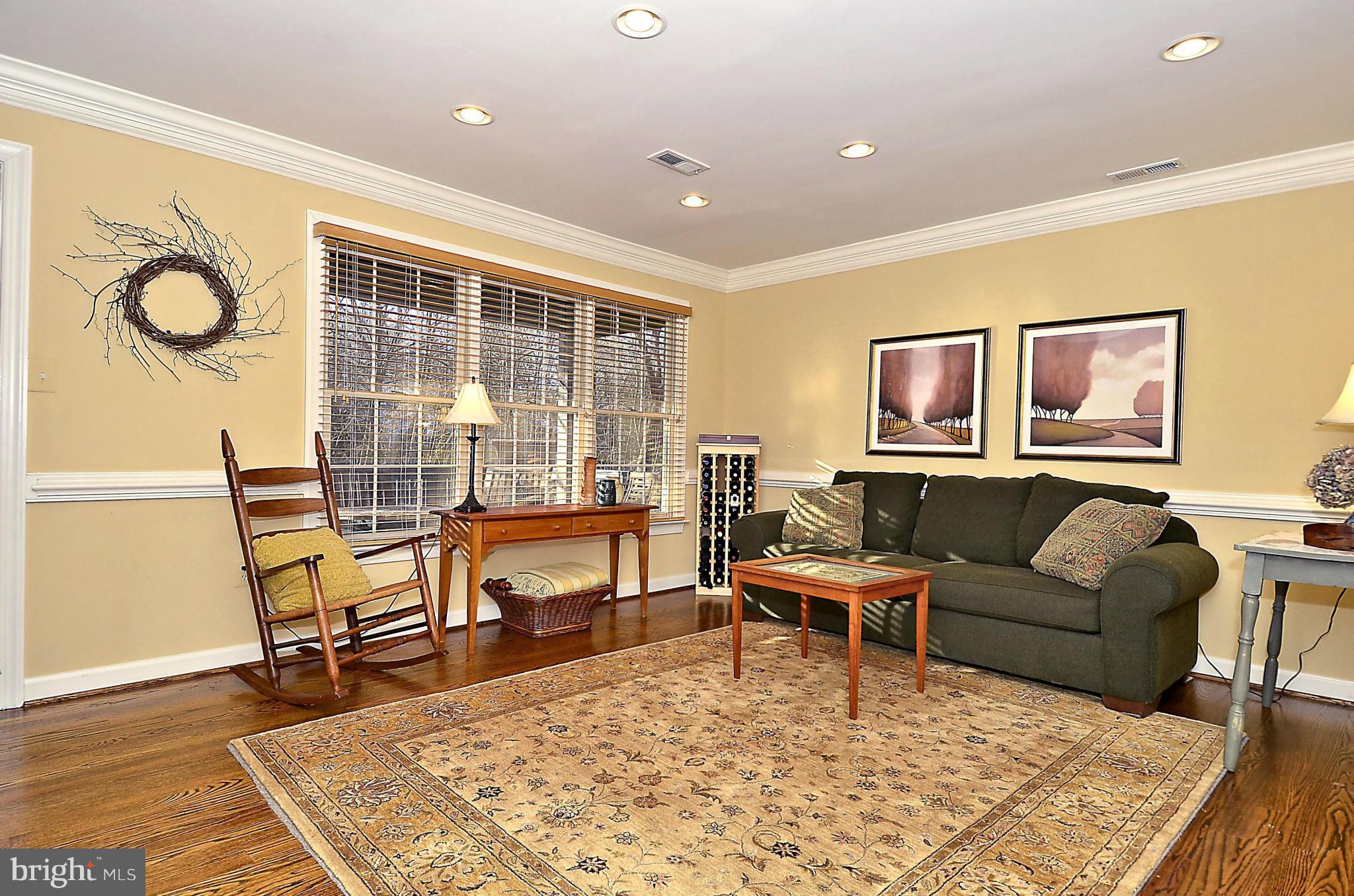 148 Rees Place Falls Church, VA 22046 - Photo 24 of 29 a living room with furniture and a table