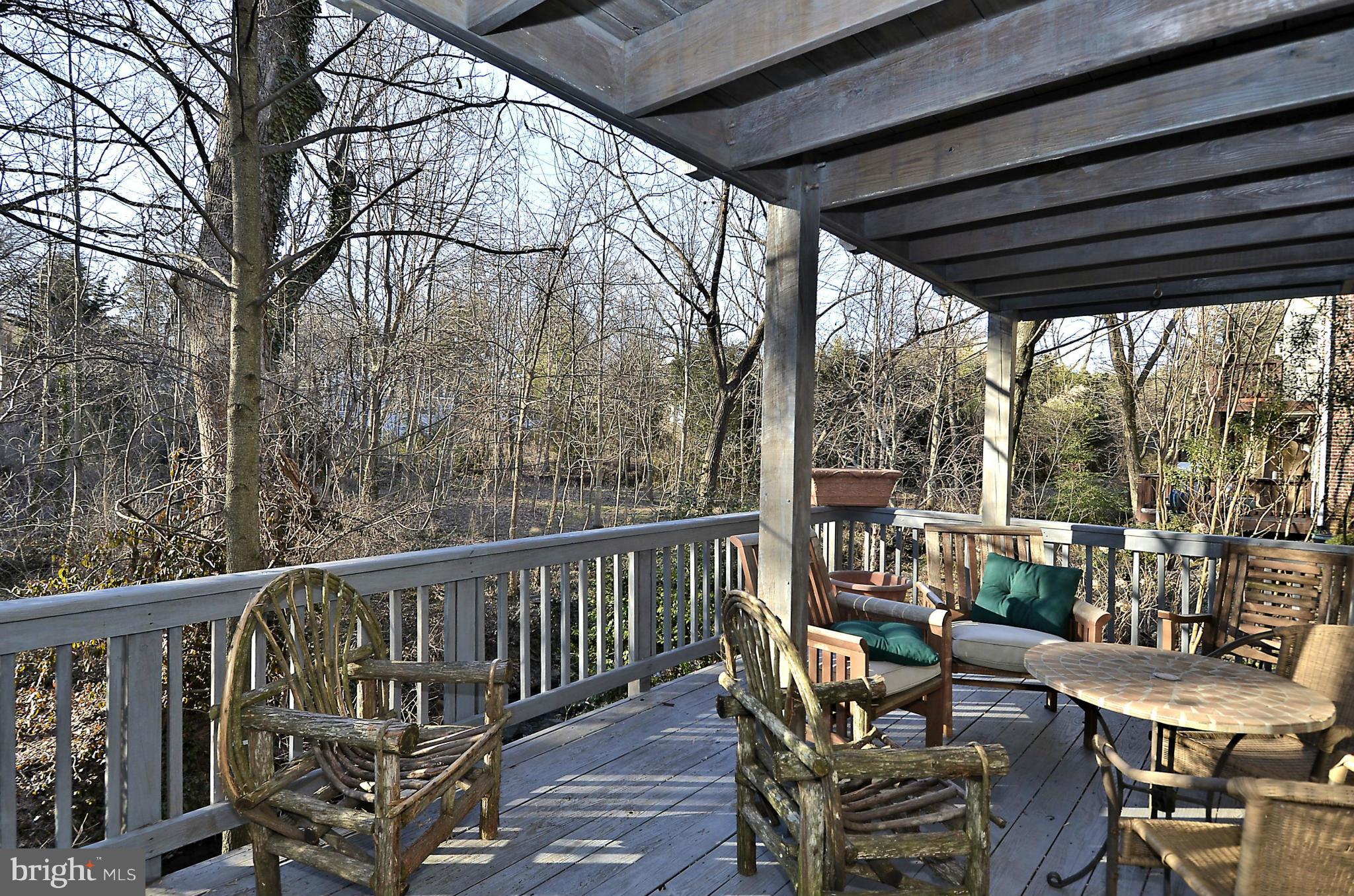 148 Rees Place Falls Church, VA 22046 - Photo 5 of 29 a view of a chair and tables in the balcony