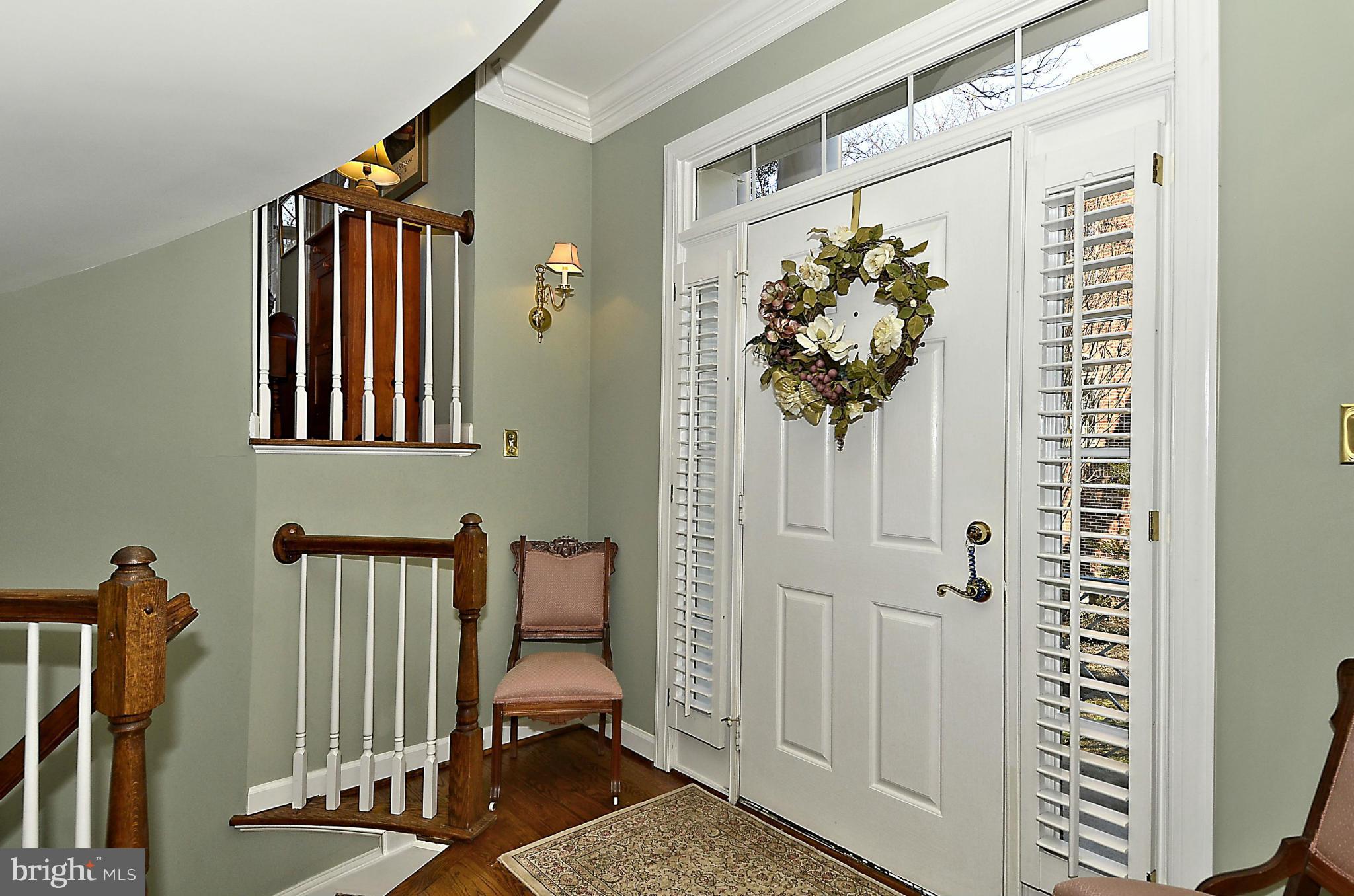 148 Rees Place Falls Church, VA 22046 - Photo 8 of 29 a view of a hallway with a livingroom and furniture