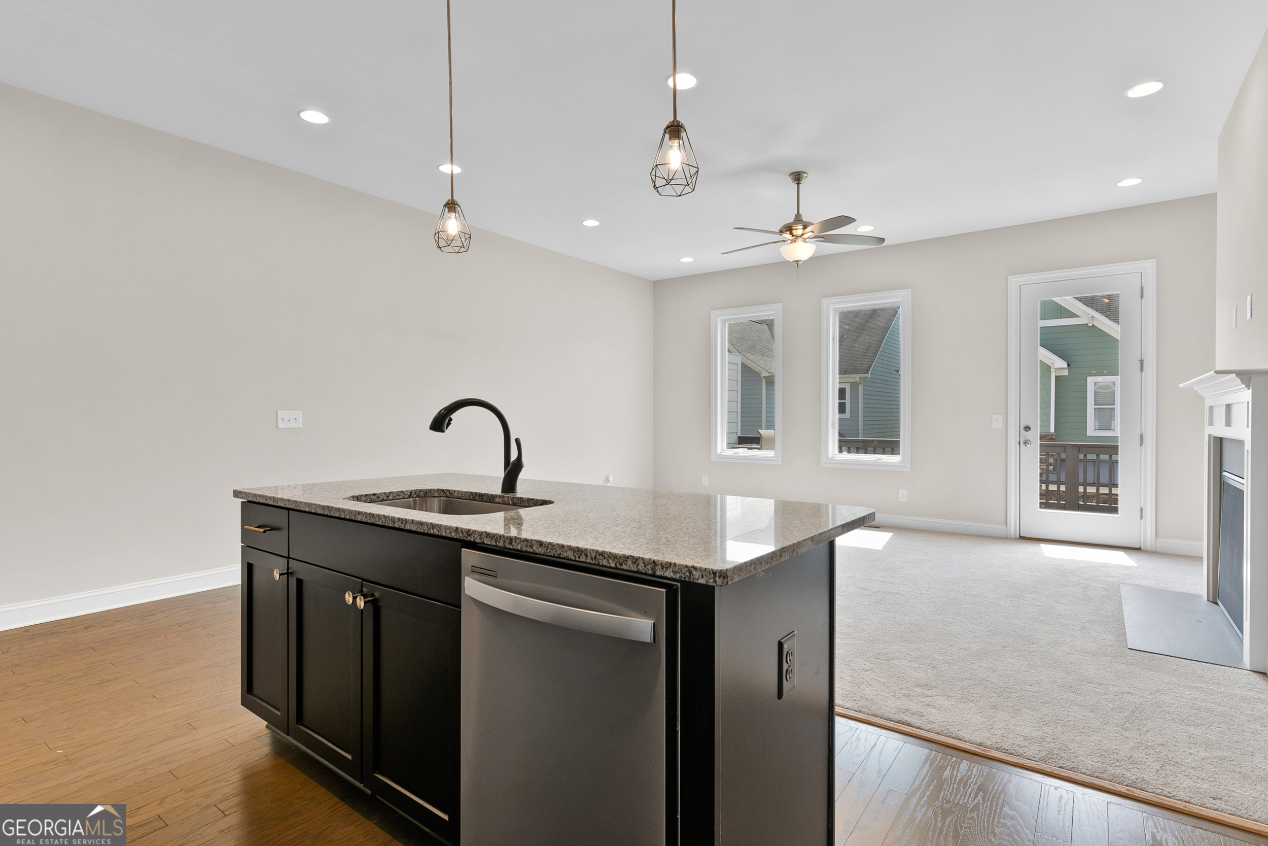 1954 Summit Trace Circle Northwest Atlanta, GA 30318 - Photo 11 of 45 a view of a kitchen with a sink and chandelier