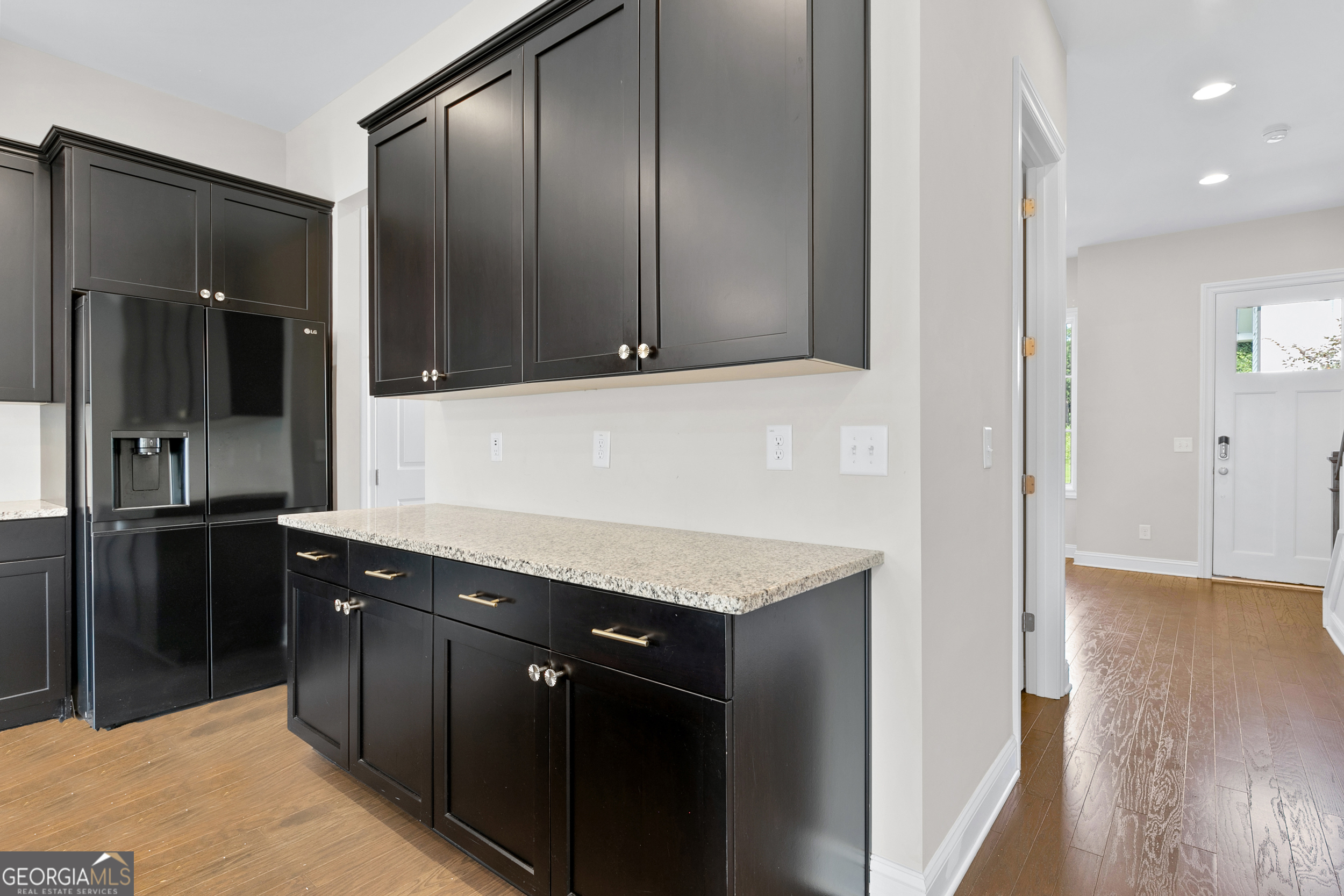 1954 Summit Trace Circle Northwest Atlanta, GA 30318 - Photo 15 of 45 a kitchen with a sink and a refrigerator
