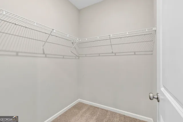 a view of a room with racks on the wall