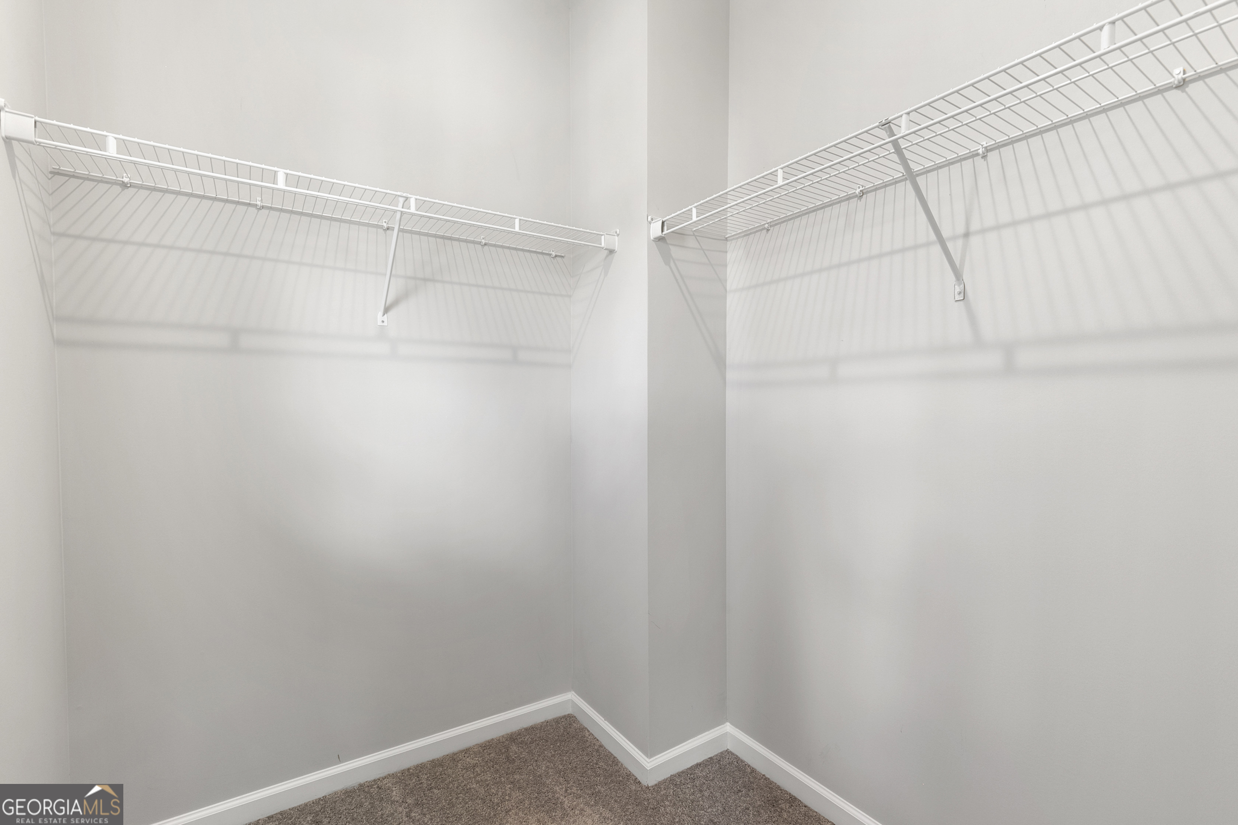 1954 Summit Trace Circle Northwest Atlanta, GA 30318 - Photo 27 of 45 a view of an empty walk in closet