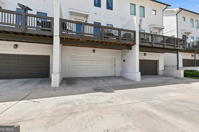 a front view of a building with a garage