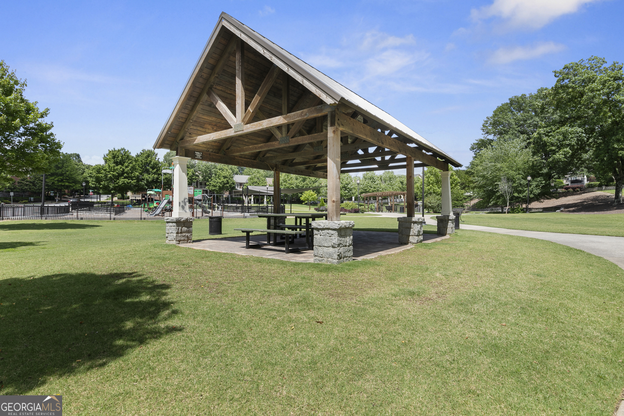 1954 Summit Trace Circle Northwest Atlanta, GA 30318 - Photo 40 of 45 a view of a house with backyard and sitting area