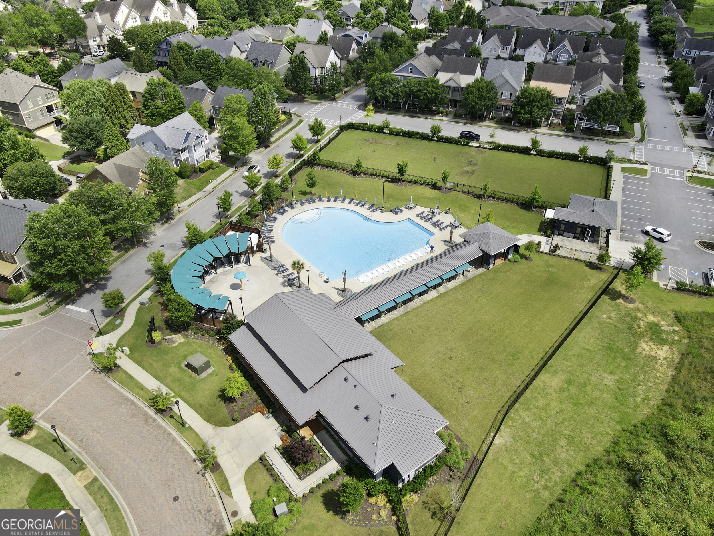 1954 Summit Trace Circle Northwest Atlanta, GA 30318 - Photo 43 of 45 an aerial view of a house with a swimming pool yard and outdoor seating