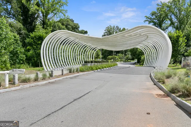 a view of a house with a street