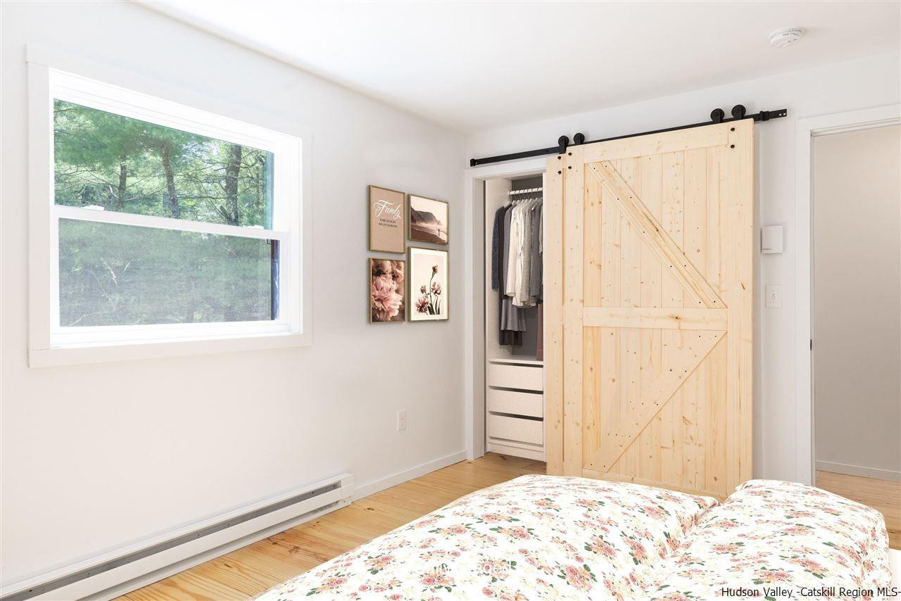 5646 Red Hill Road Claryville, NY 12725 - Photo 17 of 35 a view of a small space with wooden floor and a window