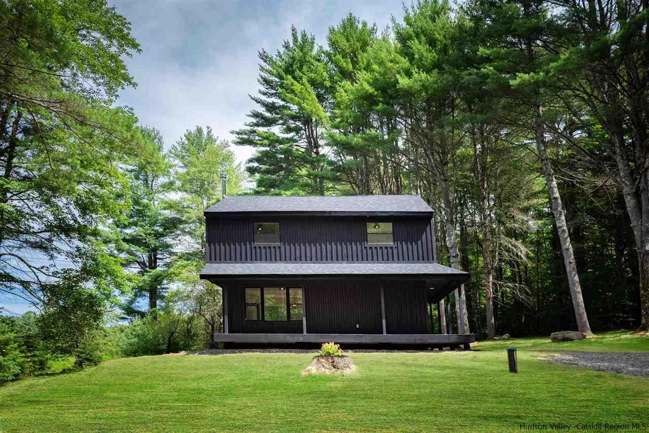 5646 Red Hill Road Claryville, NY 12725 - Photo 2 of 35 a front view of a house with a yard