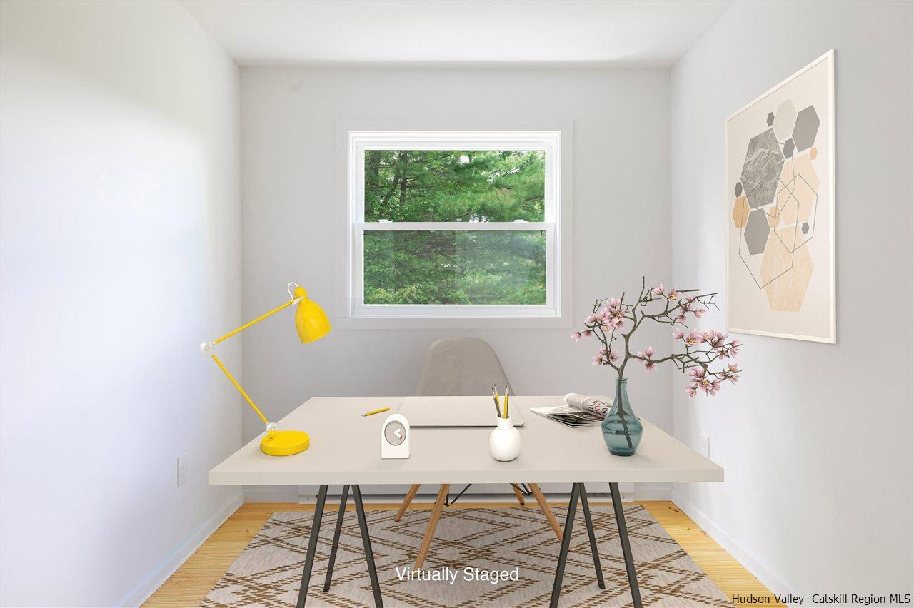 5646 Red Hill Road Claryville, NY 12725 - Photo 21 of 35 a view of a dining room with a table and chairs