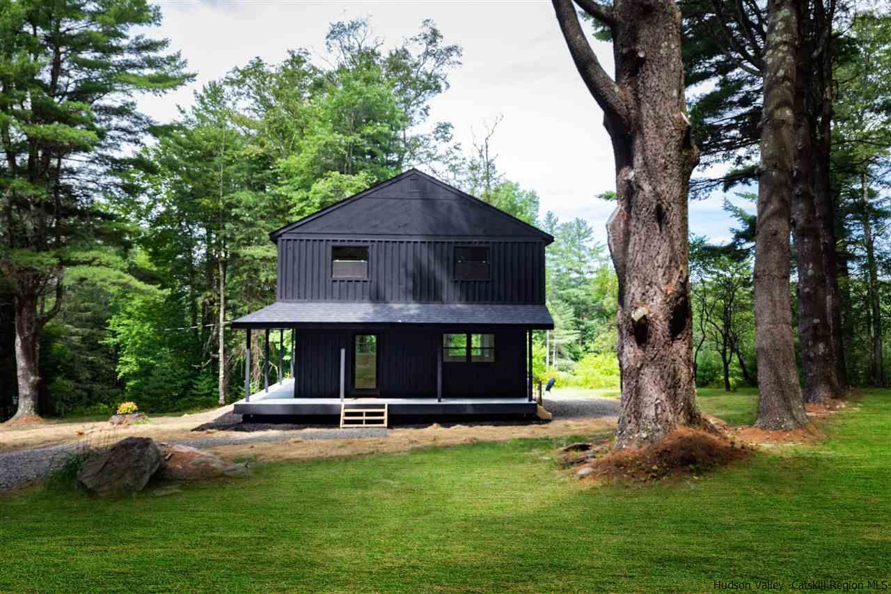 5646 Red Hill Road Claryville, NY 12725 - Photo 28 of 35 a view of a house with a yard plants and large tree