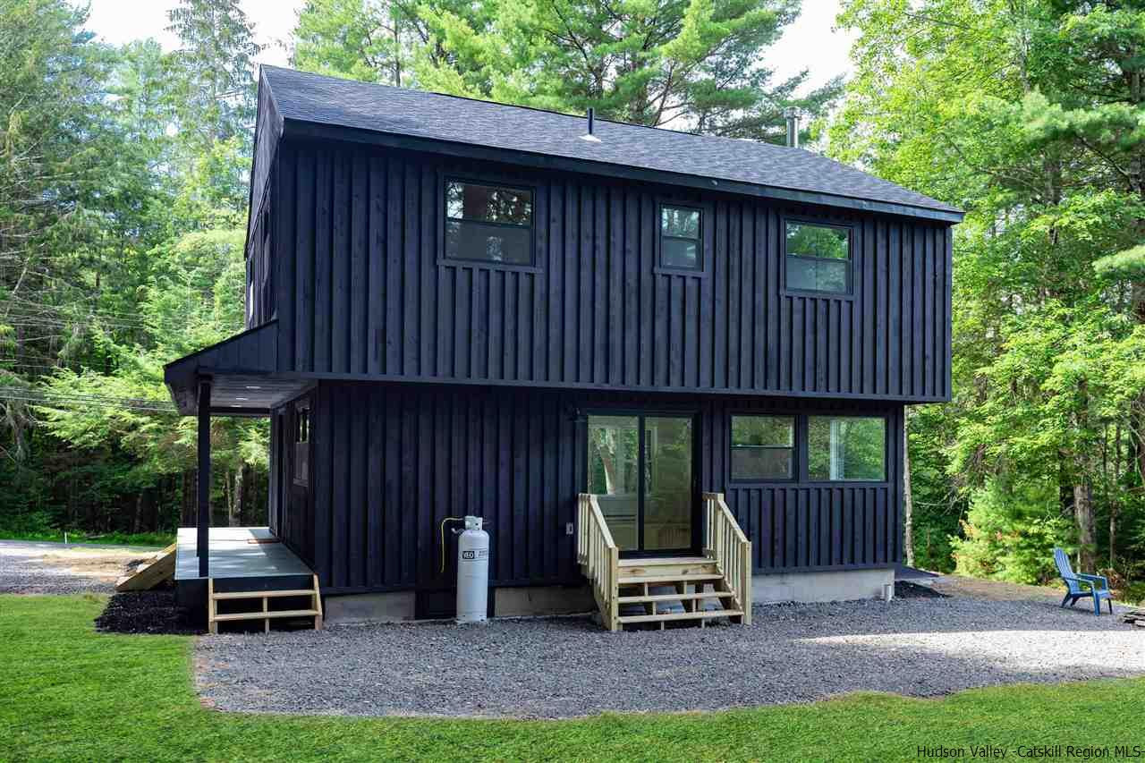 5646 Red Hill Road Claryville, NY 12725 - Photo 30 of 35 a patio with a table and chairs
