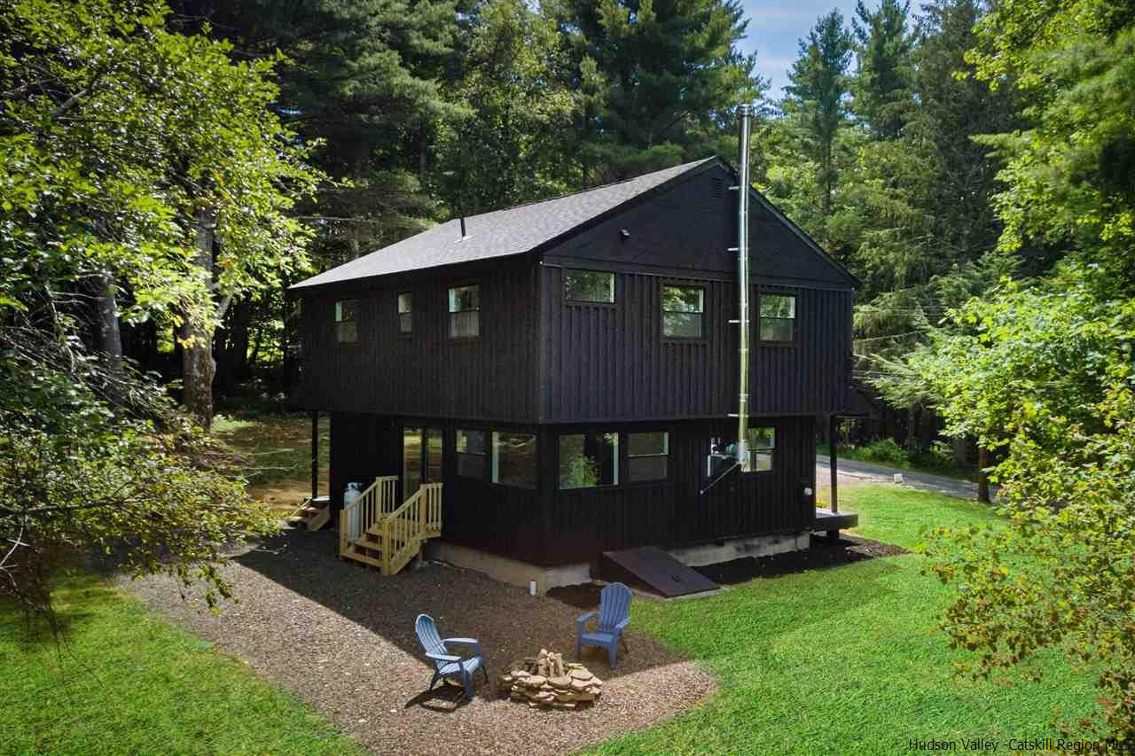 5646 Red Hill Road Claryville, NY 12725 - Photo 31 of 35 a front view of a house with garden